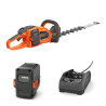 Pack taille-haie à batterie Husqvarna 322iHD60 + batterie 4Ah + chargeur modal atc