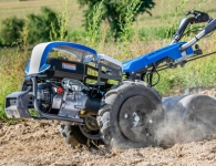 Machine motoculteur et motobineuse
